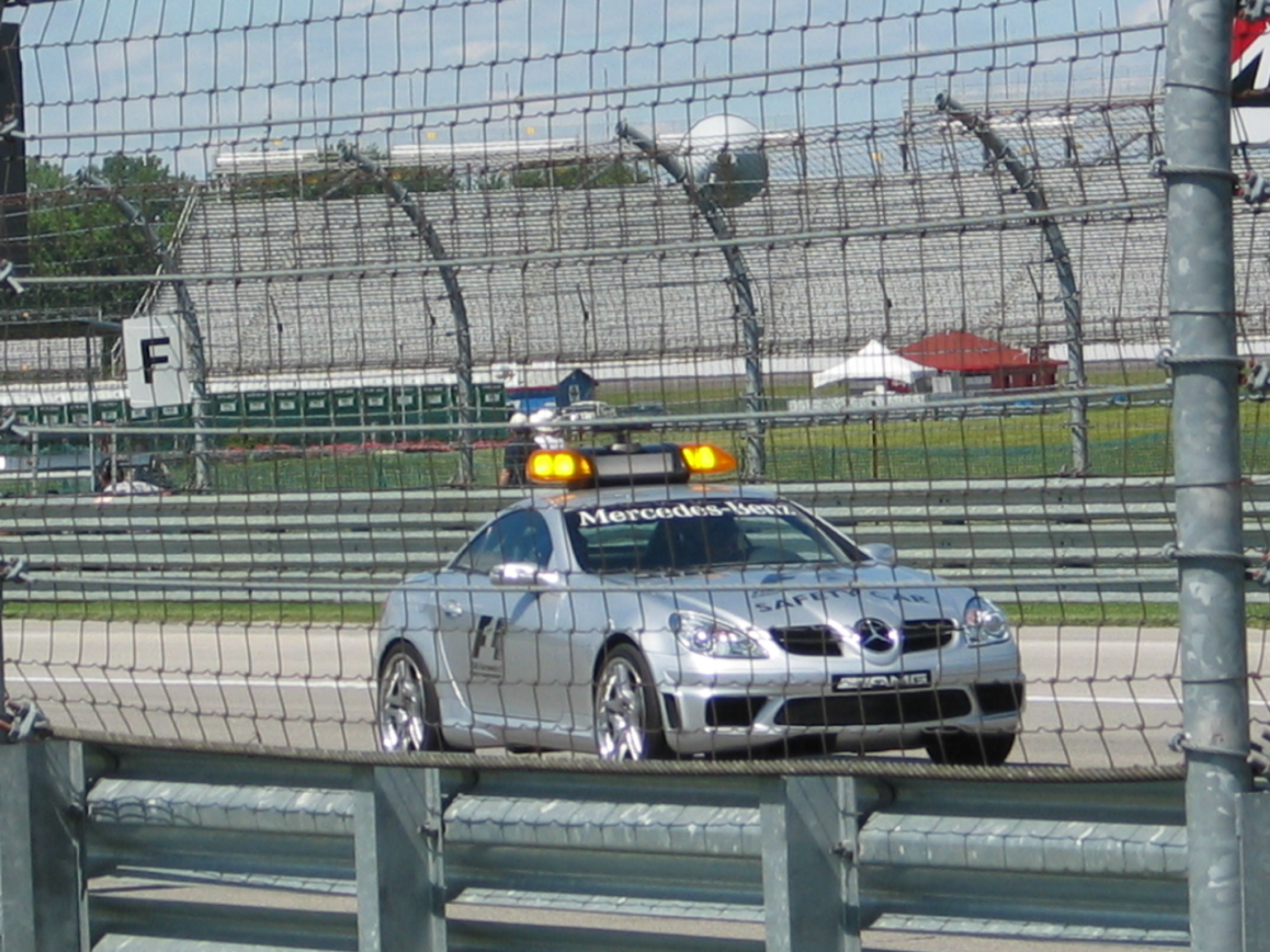 A Formula 1 safety car on a Grand Prix race track